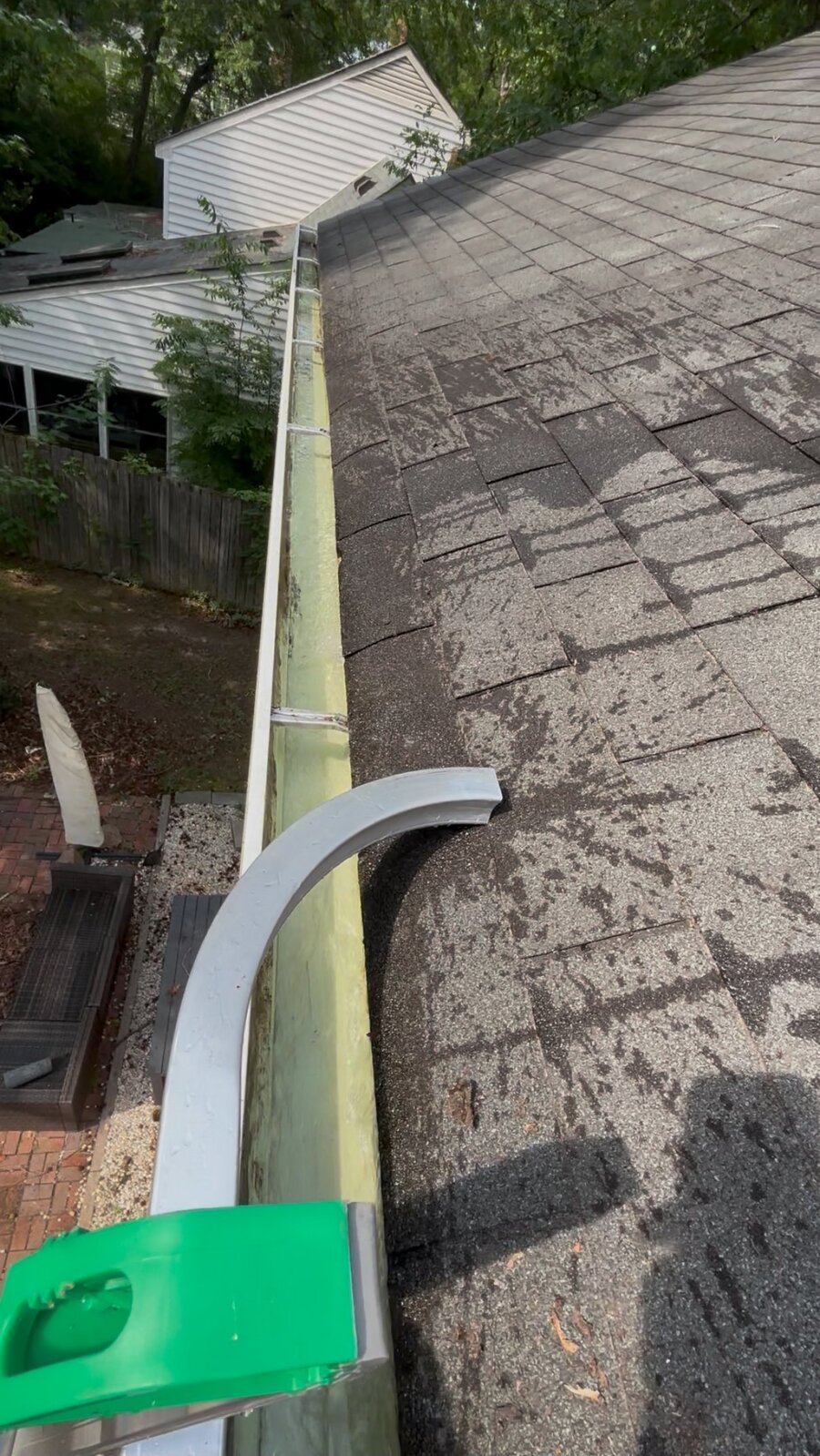 Gutter cleared out and brightened after cleaning